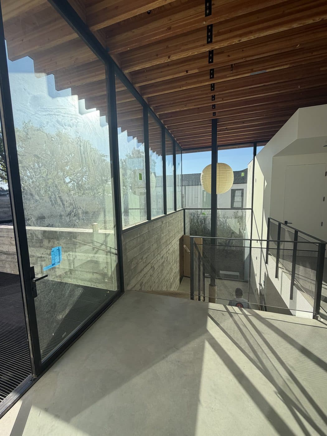 A bright modern interior with large clean glass walls cleaned by Window Wizards